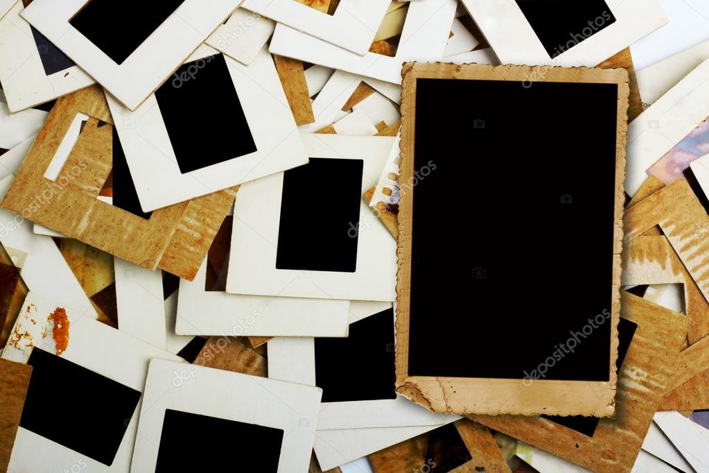 Set of old slides, photos and film on the table