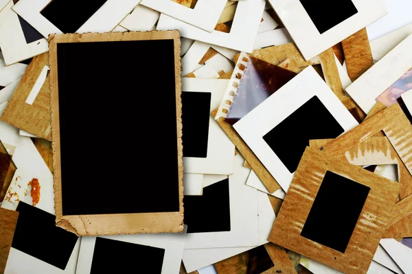 Set of old slides, photos and film on the table — Stock Photo, Image