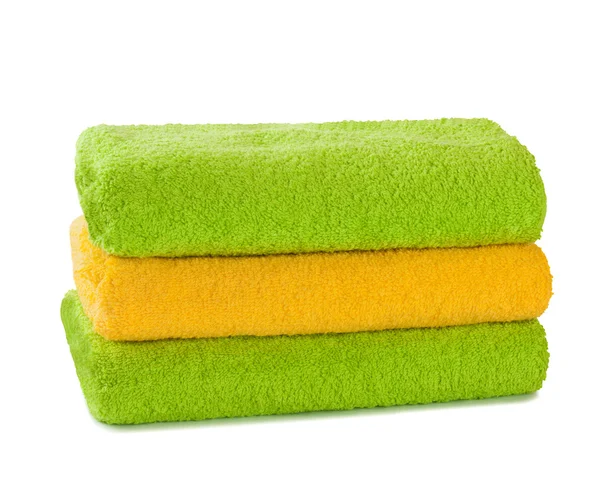 Stack of clean fresh towels isolated — Stock Photo, Image