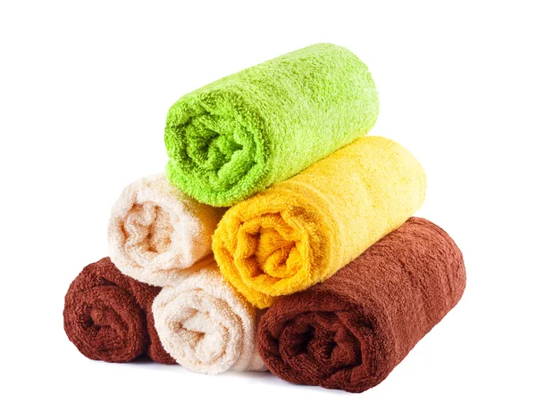 Stack of clean fresh towels isolated — Stock Photo, Image