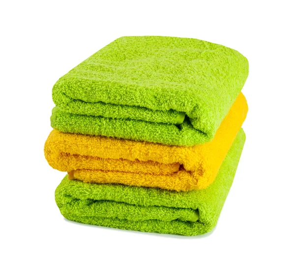 Stack of clean fresh towels isolated — Stock Photo, Image