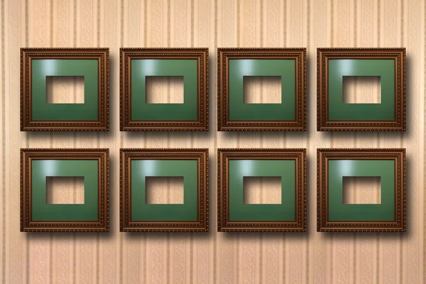 Vergulde houten frames voor foto's op de achtergrond — Stockfoto