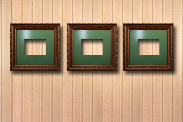 Gilded wooden frames for pictures on background — Stock Photo, Image