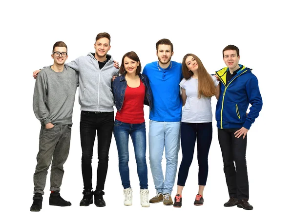 Gruppe lächelnder Freunde, die zusammen bleiben und in die Kamera schauen — Stockfoto