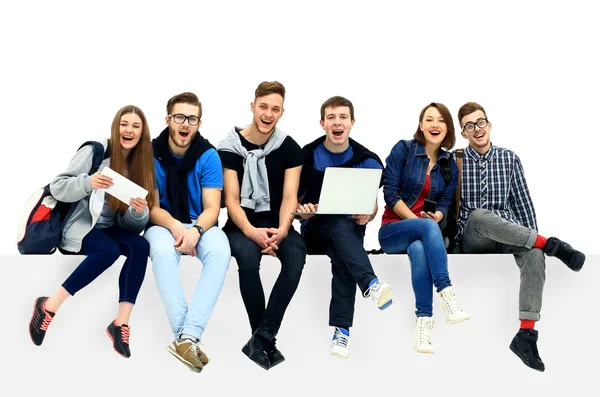 Causal group of people sitting on the floor isolated — Stock Photo, Image