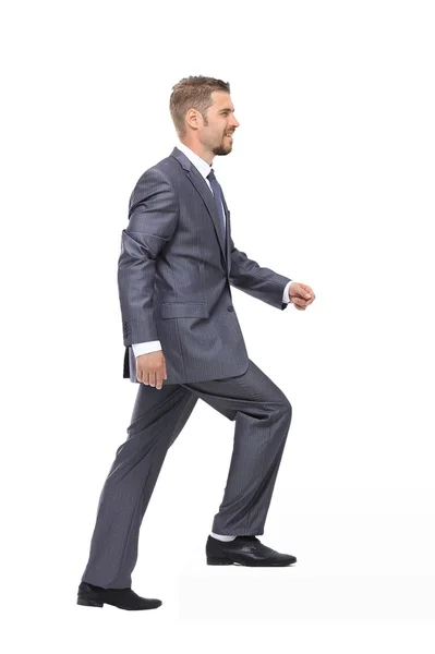 Empresario subiendo la escalera sobre fondo blanco — Foto de Stock