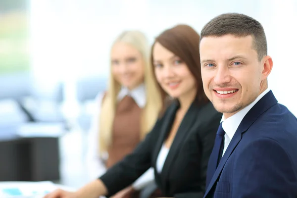 Businesspeople Having Meeting Around Table In Modern Office — Stock Photo, Image