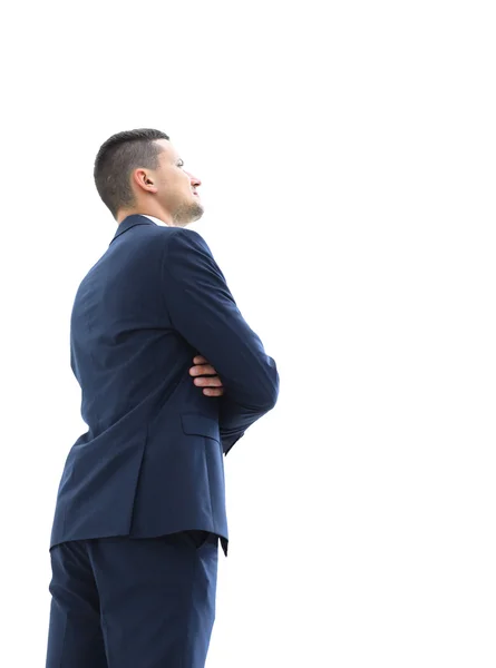 Hombre de negocios mirando algo aislado sobre fondo blanco — Foto de Stock