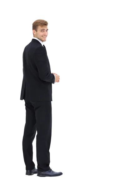 Homem de negócios isolado em branco. Vista lateral . — Fotografia de Stock