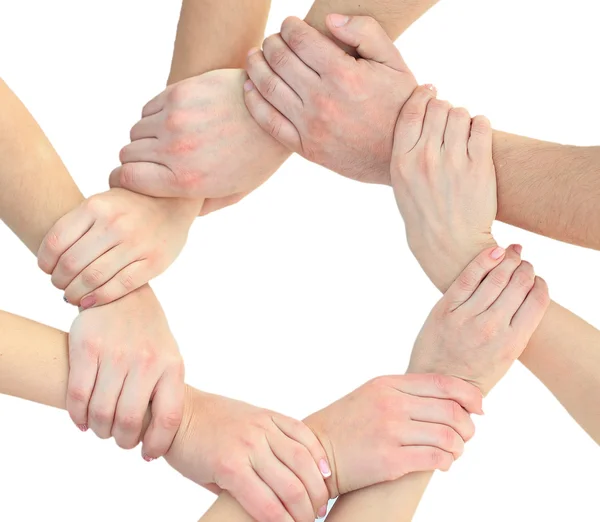 Business people joining hands in a circle in the office — Stock Photo, Image