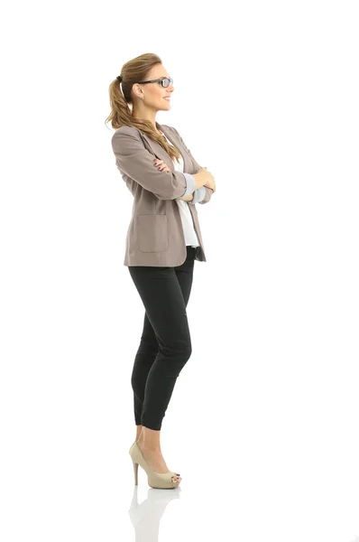 Perfil de pie mujer de negocios con fondo de pared blanco —  Fotos de Stock