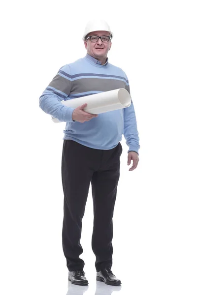 In full growth. man in a protective helmet holds a roll of drawings — Stock Photo, Image