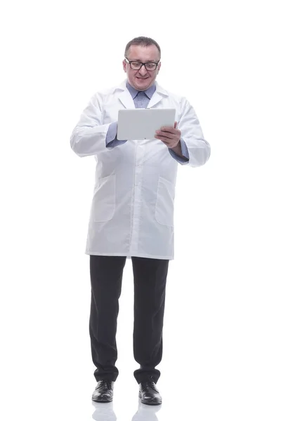In full growth. a competent doctor using a digital tablet — Stock Photo, Image