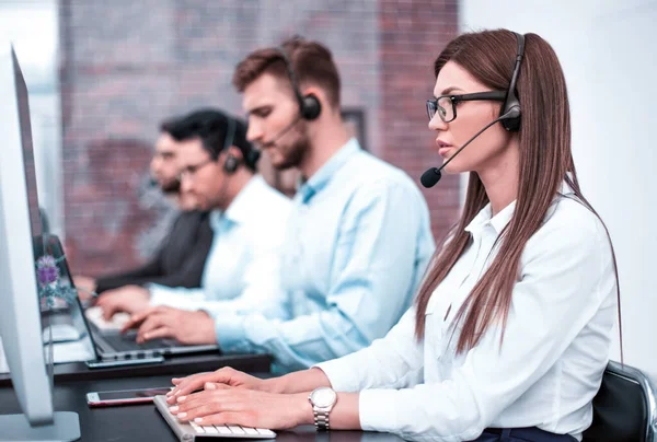 Young employee call center talking with the client — Stock Photo, Image