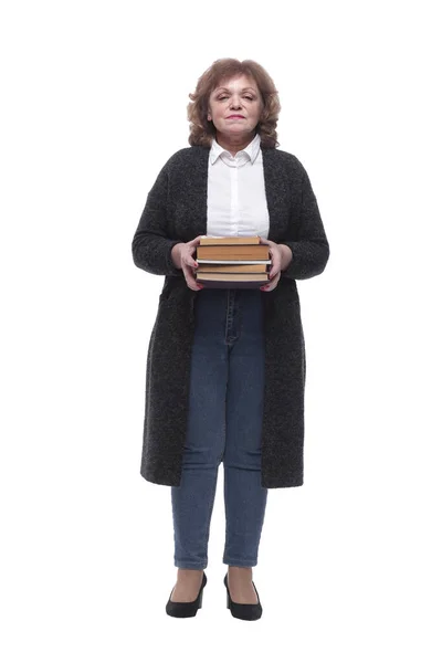In piena crescita. una donna sicura di sé con una pila di libri. — Foto Stock