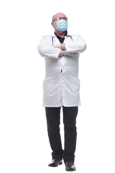 In volle groei. een serieuze arts met een beschermend masker — Stockfoto