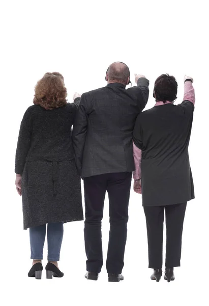 Vista trasera. personas en un auricular apuntando a una pantalla blanca en blanco — Foto de Stock