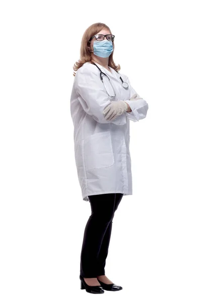 보호용 마스크를 쓴 진지 한 치료사가 당신을 쳐다보고 있어요 — 스톡 사진