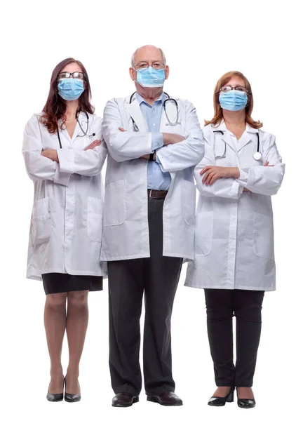 Groep artsen in beschermende maskers die naar u kijken — Stockfoto