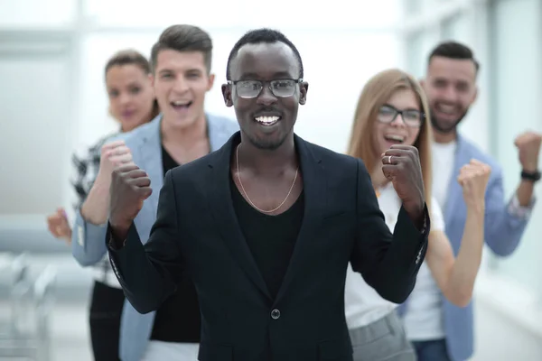 Multiracial group of businessmen rejoices in victory — Stock Photo, Image