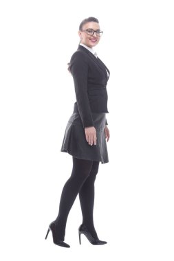 Yan görünüş. Kendine güvenen iş kadını kameraya bakıyor.