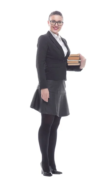 In vollem Wachstum. eine lächelnde Geschäftsfrau mit einem Stapel Bücher — Stockfoto
