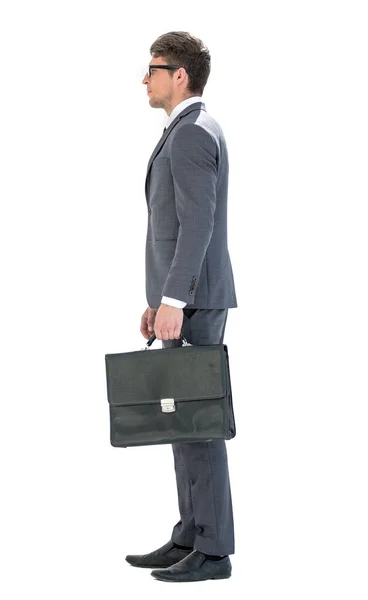 Вид сбоку. уверенный бизнесмен с кожаным портфелем — стоковое фото