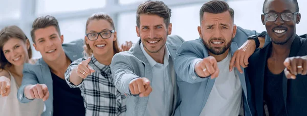 Group of people pointing at the camera and smiling - isolated — Stock Photo, Image