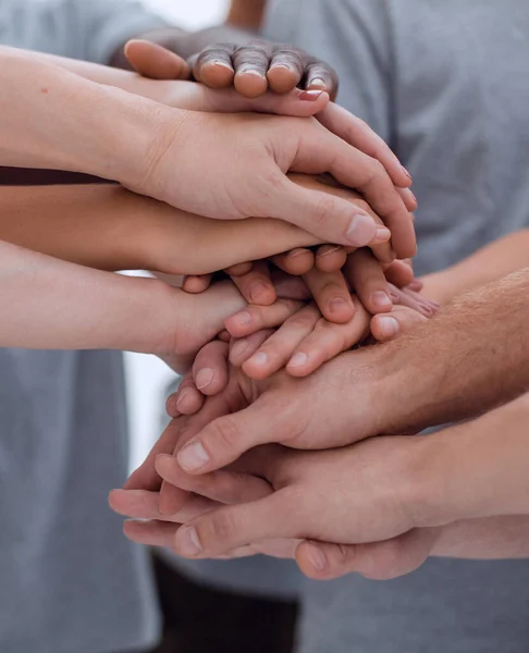 Close up. young people making a tower of hands. — Stock Photo, Image