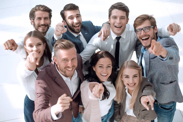 Happy team of successful young business people pointing at you — Stock Photo, Image