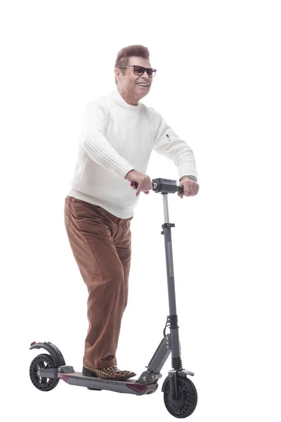 In full growth. casual adult male with electric scooter. — Stock Photo, Image