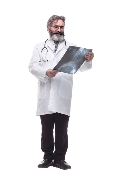 Smiling doctor with an x-ray of a patient. isolated on a white — Stock Photo, Image