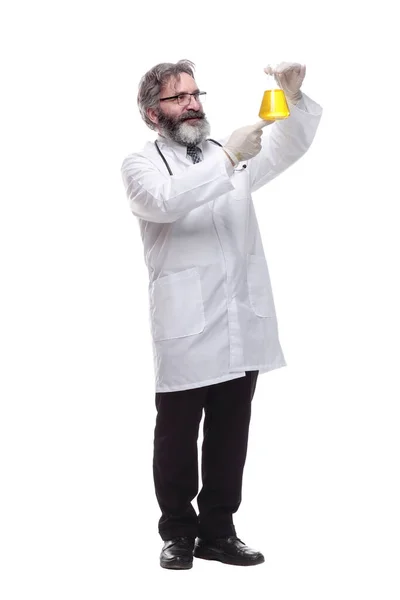 Smiling doctor with a laboratory flask . isolated on a white — Stock Photo, Image