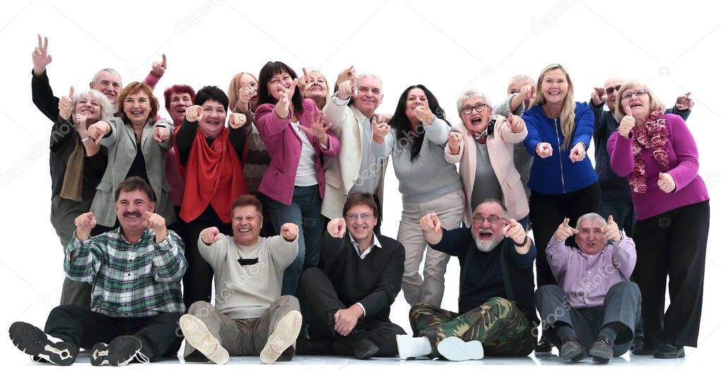 group of happy mature people pointing at you