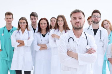Üst Manzara. Bir grup gülümseyen doktor seni işaret ediyor..