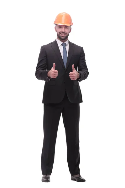 Бізнесмен в шоломі показує великі пальці вгору. ізольовані на білому — стокове фото