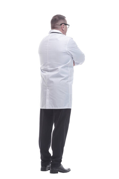 rear view. mature doctor reading an ad on a white screen