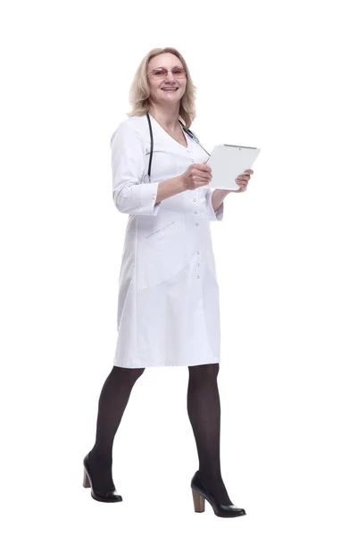 Qualified doctor with a digital tablet stepping up to you. — Stock Photo, Image