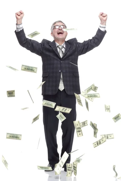 Happy man standing in the rain of money. isolated on a white — Stock Photo, Image