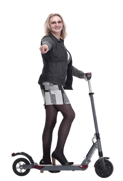 Side view. modern young woman with an electric scooter. — Stock Photo, Image