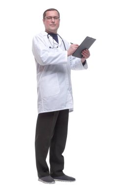 Tam gelişim. Steteskoplu bir doktor not alıyor..