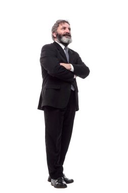 Takım elbiseli bir adam beyaz beyaz bir ekrana bakıyor.