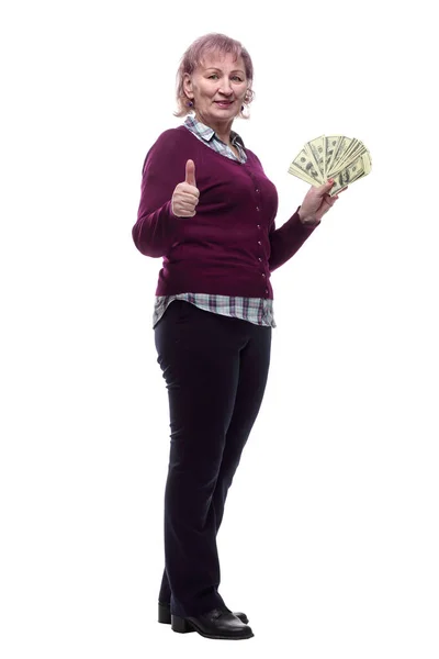 돈 지폐를 가진 성인 여성이 엄지손가락을 들고 있다 — 스톡 사진