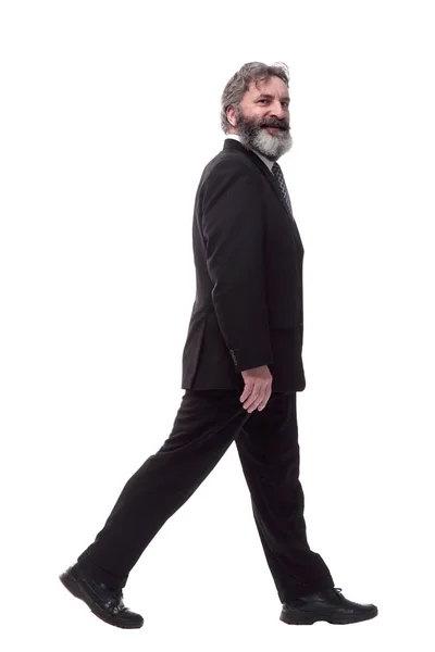 Cheerful bearded man striding forward. isolated on a white — Stock Photo, Image