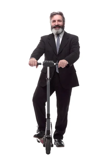 Hombre de negocios barbudo con un scooter eléctrico. aislado en un blanco — Foto de Stock