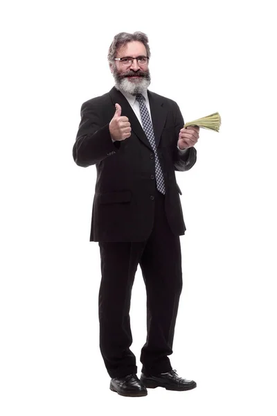 Hombre de negocios sonriente con un paquete de billetes. —  Fotos de Stock