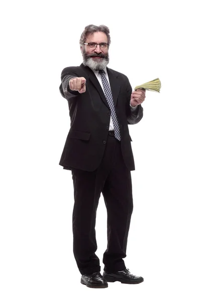 Hombre de negocios sonriente con un paquete de billetes. — Foto de Stock