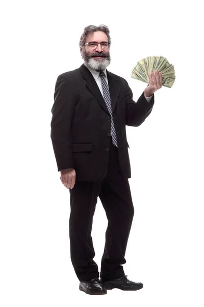 Smiling businessman with a bundle of banknotes. — 图库照片