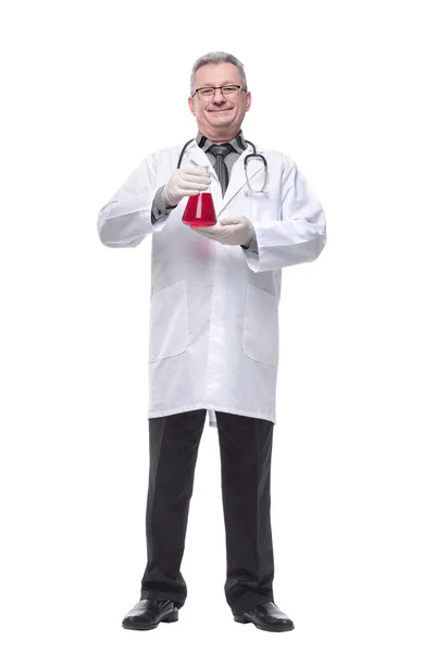 Doctor holding up beaker of red chemical in the laboratory — Stock Photo, Image