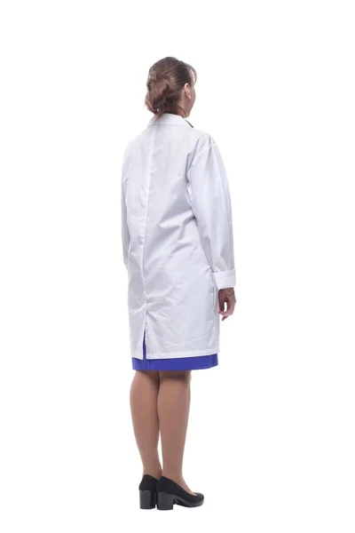 Female health care worker from the back - looking at something — Stock Photo, Image